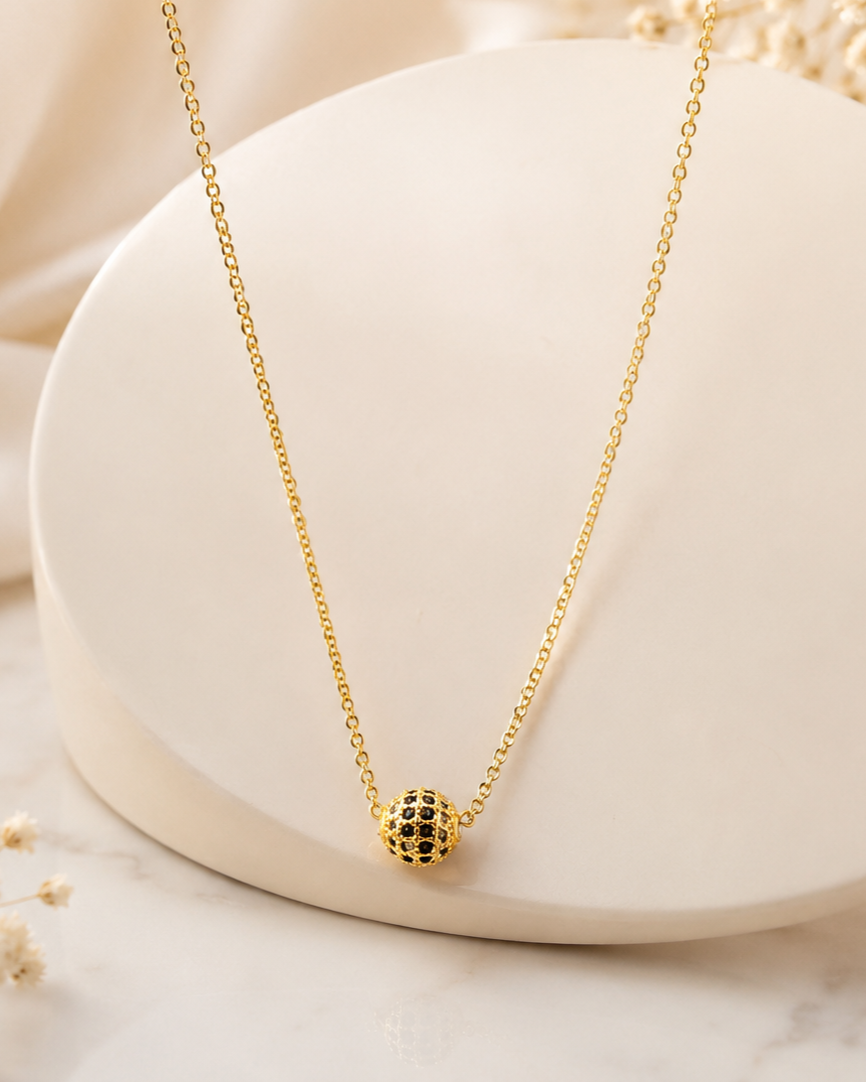 Black Stone Necklace with Crystal-Studded Ball Pendant & Gold Replica Chain